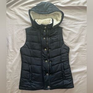Women’s black puffer vest